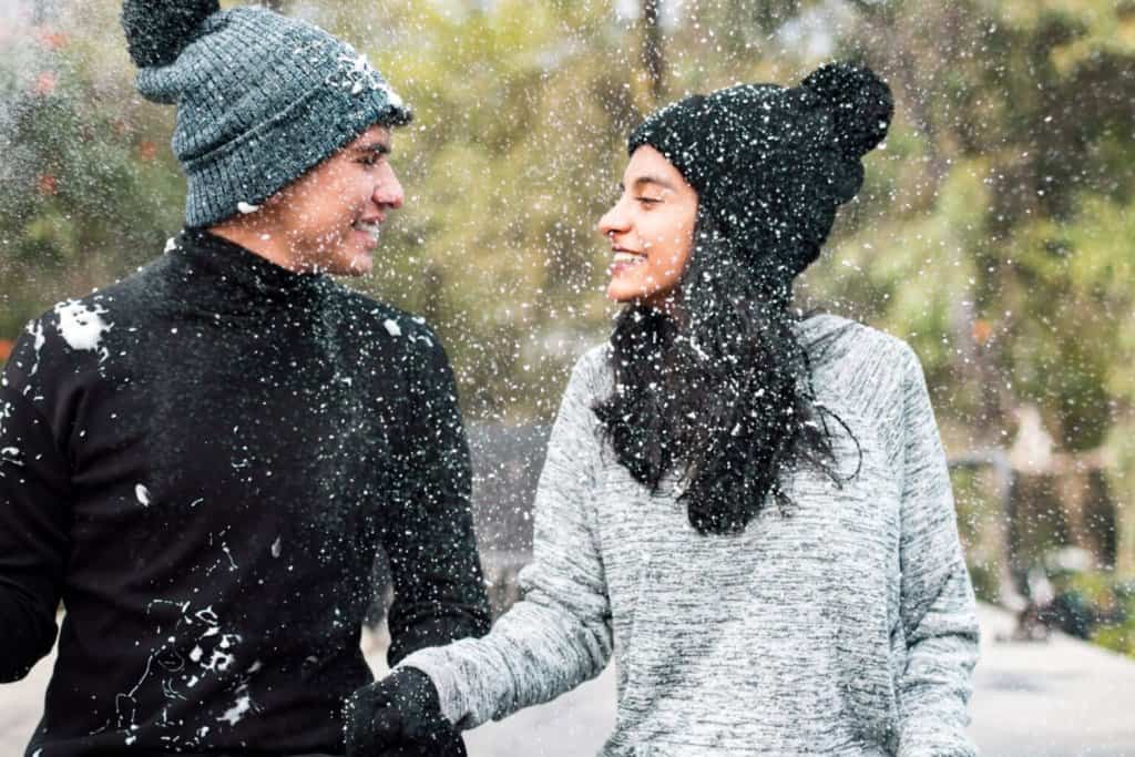 The Best Winter Skin Care Routine -Winter-snow-couple | South Ogden, UT | Timeless Skin and Wellness