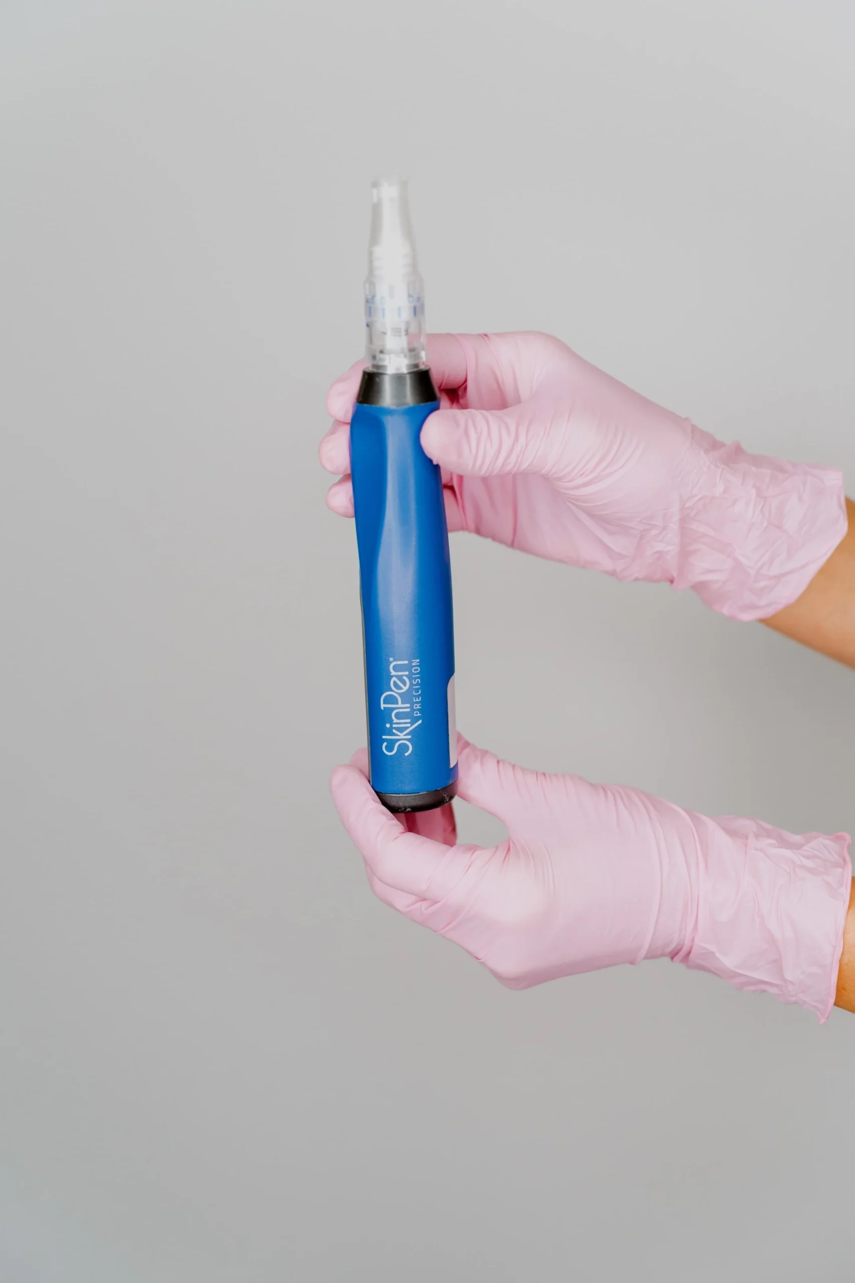 Close-up of a microneedling procedure using a SkinPen devic